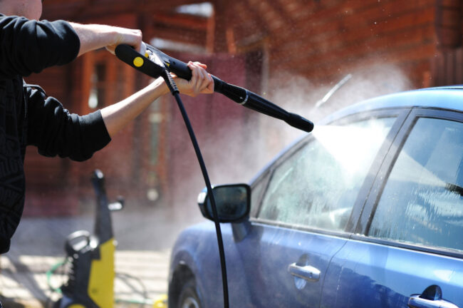 Pressure washer on car