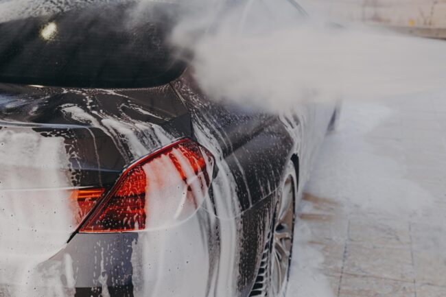 Pressure washer on car