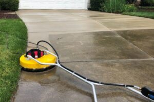 Pressure cleaning a driveway