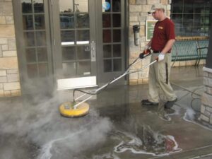 Pressure cleaning concrete driveway