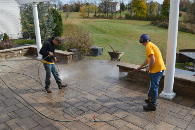 Pressure wash brick driveway